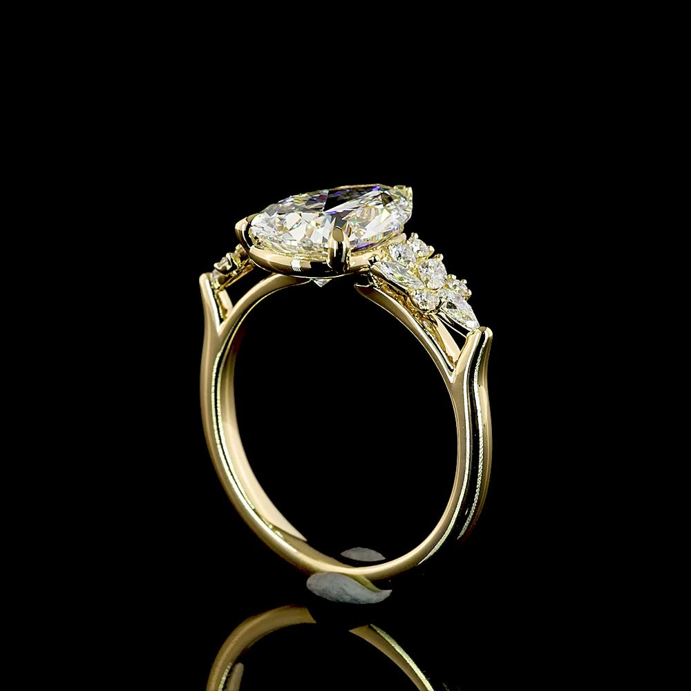 14K Yellow Gold Pear Shape Lab Diamond Ring with Mixed Shape Accents - 3.36 Carat Total Diamond Weight, E VVS2 Center Stone - Covaloro Fine Jewelry