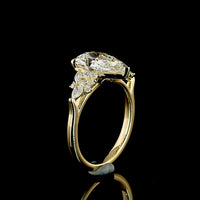 14K Yellow Gold Pear Shape Lab Diamond Ring with Mixed Shape Accents - 3.36 Carat Total Diamond Weight, E VVS2 Center Stone - Covaloro Fine Jewelry