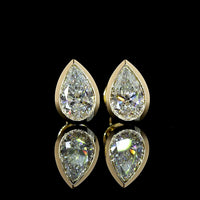14K Yellow Gold Pear Shaped Bezel Set Lab Diamond Stud Earrings with IGI Certified E-F VVS2 Stones - 1.51 Carat Total Weight - Covaloro Fine Jewelry