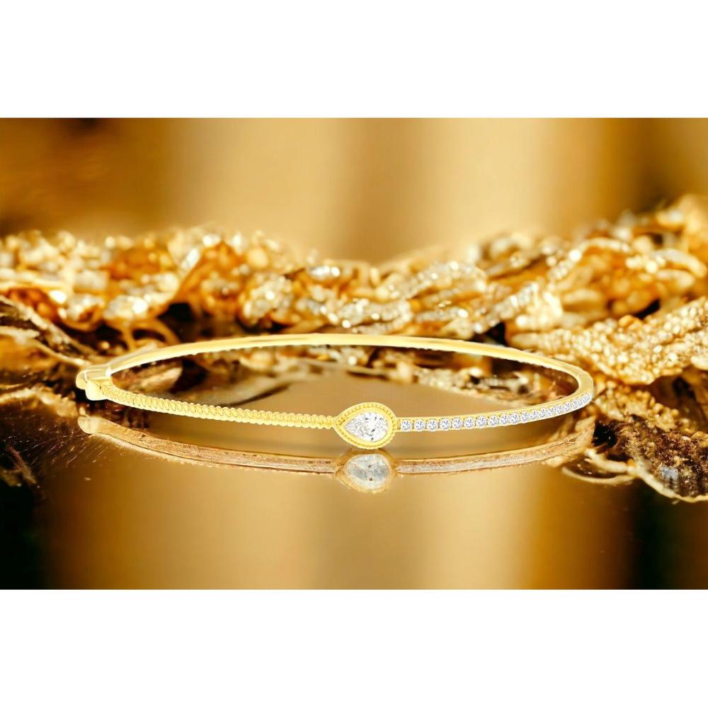 14K Yellow Gold Pear-Shaped Diamond Bangle with Milgrain Detail and Round Diamond Tennis Accents - 0.55 Carat Total Diamond Weight - Royal Jewelry