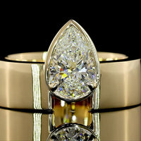 14K Yellow Gold Pear-Shaped Solitaire Ring with 1.10 Carat Lab-Grown Diamond - E-F Color VS1 Clarity, Bezel-Prong Setting - Covaloro Fine Jewelry