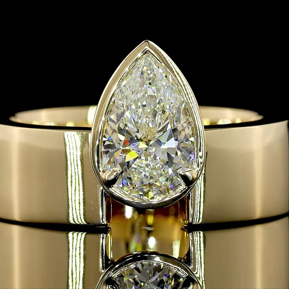 14K Yellow Gold Pear-Shaped Solitaire Ring with 1.10 Carat Lab-Grown Diamond - E-F Color VS1 Clarity, Bezel-Prong Setting - Covaloro Fine Jewelry