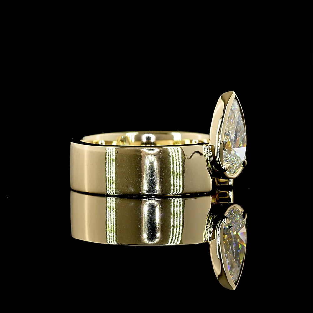 14K Yellow Gold Pear-Shaped Solitaire Ring with Bezel-Prong Set Lab Diamond - 1.33 Carat Total Weight, E-F Color VS1 Clarity - Covaloro Fine Jewelry