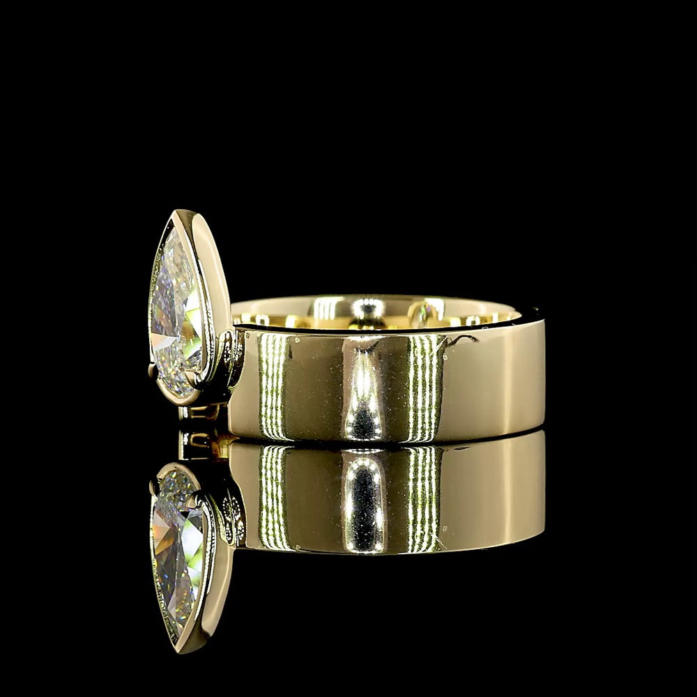 14K Yellow Gold Pear-Shaped Solitaire Ring with Bezel-Prong Set Lab Diamond - 1.33 Carat Total Weight, E-F Color VS1 Clarity - Covaloro Fine Jewelry