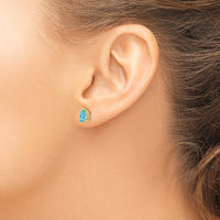 14K Yellow Gold Pear Shaped Swiss Blue Topaz Stud Earrings - 0.850 Carat Total Weight by Monteluci Fine Jewelry