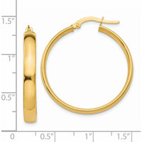 14K Yellow Gold Polished 25mm Hollow Hoop Earrings - Lightweight and Elegant Design by Monteluci Fine Jewelry