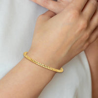 14K Yellow Gold Polished and Diamond-Cut Spiral Bangle Bracelet - 3.75mm by Oro Pregiato