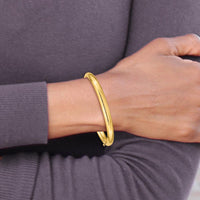 14K Yellow Gold Polished Hinged Baby Bangle with Safety Bar - 5mm Width by Oro Pregiato