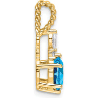 14K Yellow Gold Polished Pendant with Oval Blue Topaz and Round & Marquise Diamonds - 0.12 Carat Total Diamond Weight by Oro Pregiato
