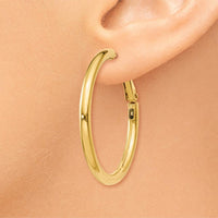 14K Yellow Gold Polished Round Hoop Earrings - 36mm with Omega Clip Back by Monteluci Fine Jewelry