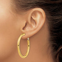 14K Yellow Gold Polished Round Omega Back Hoop Earrings - 44.5mm Length, 4mm Thickness by Oro Pregiato