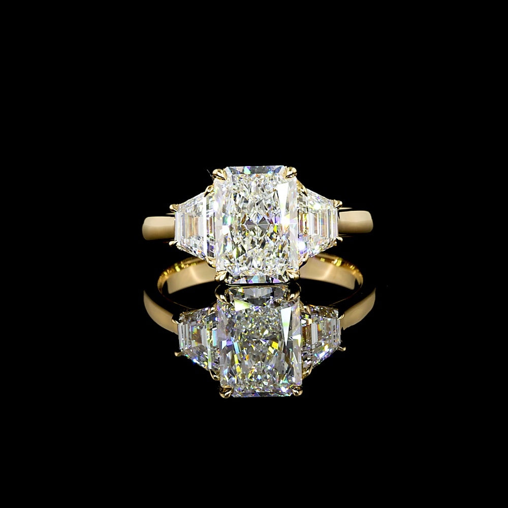 14K Yellow Gold Radiant Cut Three Stone Ring with 1.60 Carats D VVS2 Center Diamond and 0.63 Carats Trapezoid Side Stones - 2.23 Carats Total Diamond Weight - Covaloro Fine Jewelry