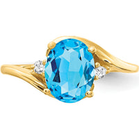 14K Yellow Gold Ring with 1.35 Carat Oval Swiss Blue Topaz and 0.017 Carat Round Diamonds by Monteluci Fine Jewelry