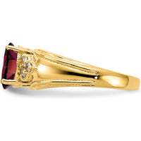 14K Yellow Gold Ring with 8x6mm Oval Garnet and 0.09 Carat Total Round Diamond Accents by Monteluci Fine Jewelry