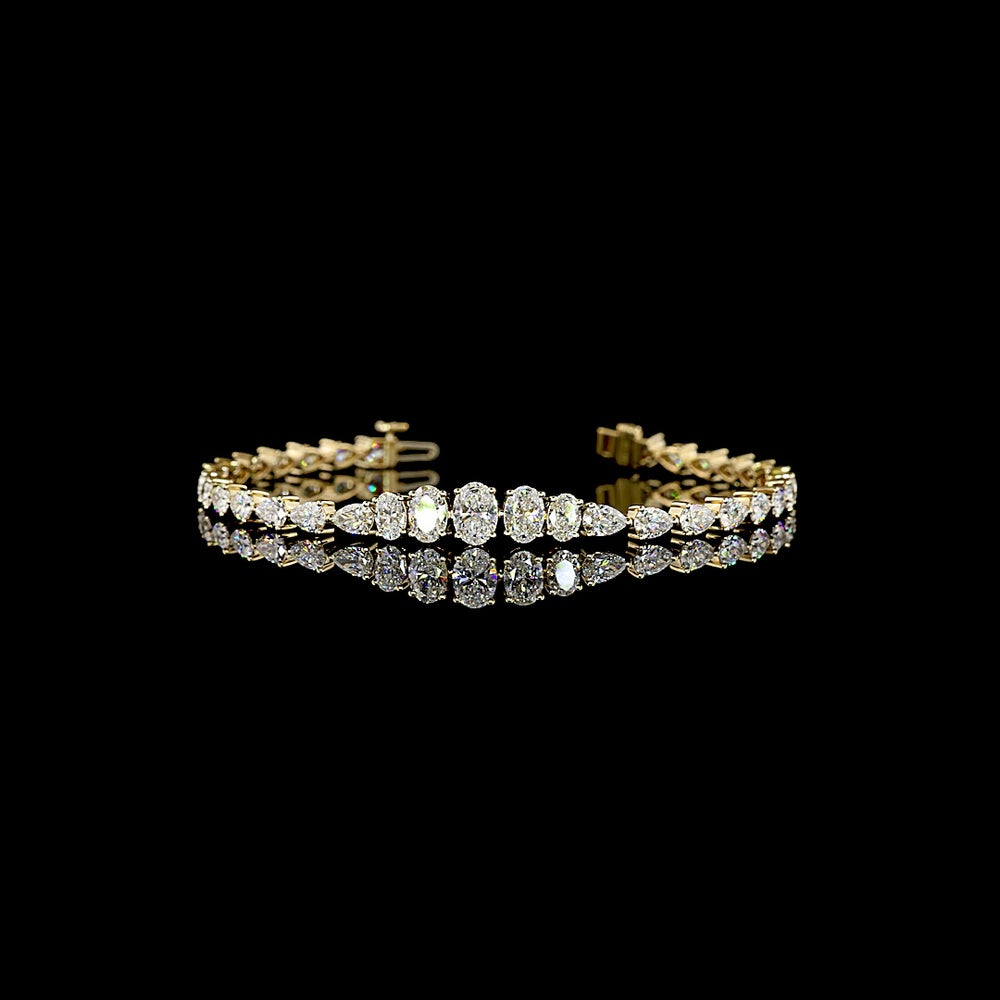 14K Yellow Gold Riviera Bracelet with 33 Graduated Oval Cut Lab Diamonds - 5.86 Carats Total Diamond Weight E-F VS1 - Covaloro Fine Jewelry