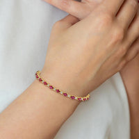 14K Yellow Gold Ruby and Diamond Tennis Bracelet - 0.32 Carats Ruby, 0.09 Carats Total Diamond Weight by Monteluci Fine Jewelry