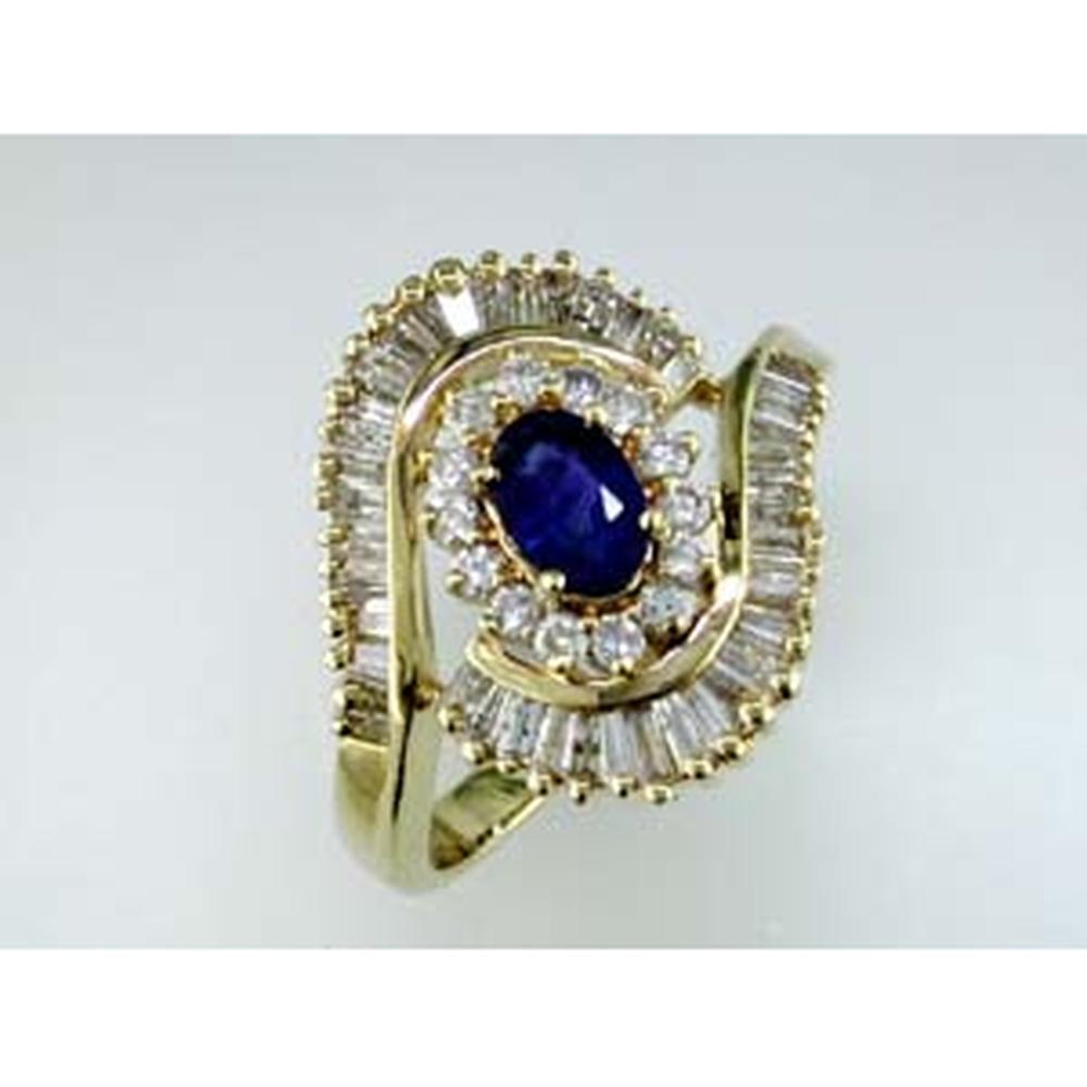 14K Yellow Gold Sapphire and Diamond Halo Ring with Oval-Cut Sapphire and Baguette & Round Diamonds - 0.65 Carat Sapphire, 0.75 Carat Diamond Total Weight - Royal Jewelry