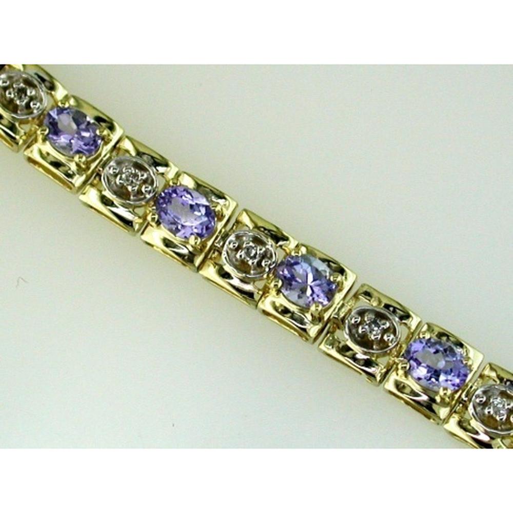 14K Yellow Gold Station Bracelet with Oval Tanzanites and Round Diamonds - 3.60 Carat Total Tanzanite Weight and 0.18 Carat Total Diamond Weight - Royal Jewelry
