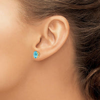 14K Yellow Gold Swiss Blue Topaz Oval Stud Earrings - 1.35 Carat Total Topaz Weight by Monteluci Fine Jewelry