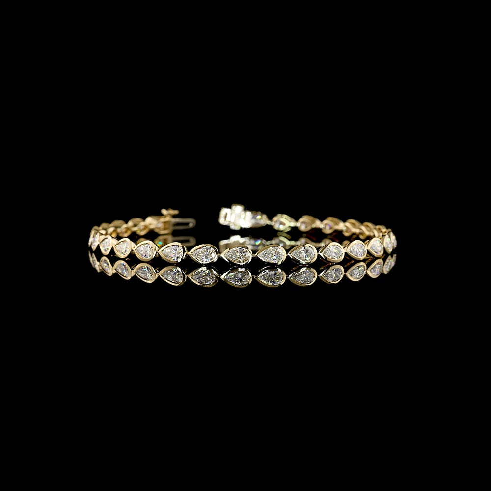 14K Yellow Gold Tennis Bracelet with 29 East-West Bezel Set Pear Shape Lab Grown Diamonds - 4.59 Carat Total Weight - Covaloro Fine Jewelry