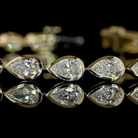 14K Yellow Gold Tennis Bracelet with 29 East-West Bezel Set Pear Shape Lab Grown Diamonds - 4.59 Carat Total Weight - Covaloro Fine Jewelry