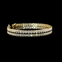 14K Yellow Gold Tennis Bracelet with Bezel Set Emerald Cut Lab Diamonds - 5.55 Carat Total Weight - Covaloro Fine Jewelry