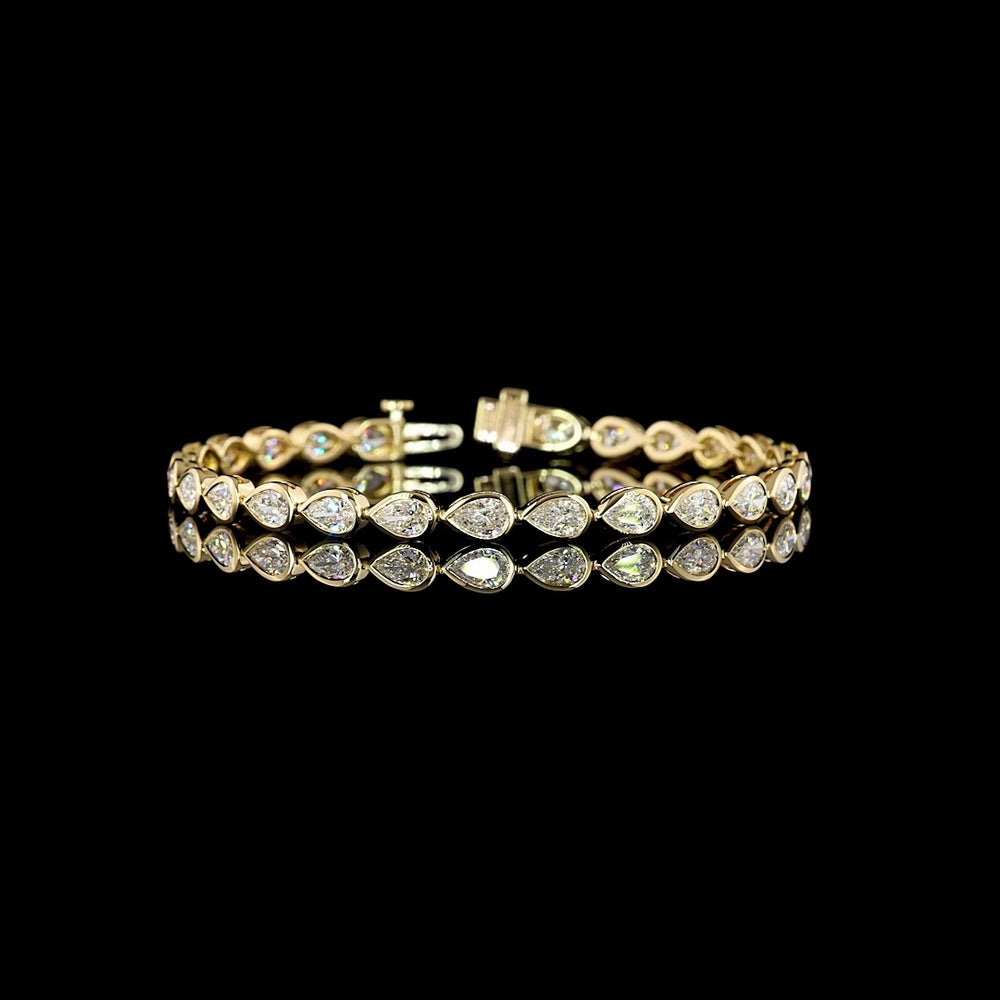 14K Yellow Gold Tennis Bracelet with East-West Bezel Set Pear Shape Lab Diamonds - 5.91 Carat Total Diamond Weight, E-F Color VS Clarity - Covaloro Fine Jewelry