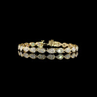 14K Yellow Gold Tennis Bracelet with East-West Bezel Set Pear Shaped Lab Diamonds - 10.98 Carat Total Weight (21 Stones, E-F Color, VS1 Clarity) - Covaloro Fine Jewelry