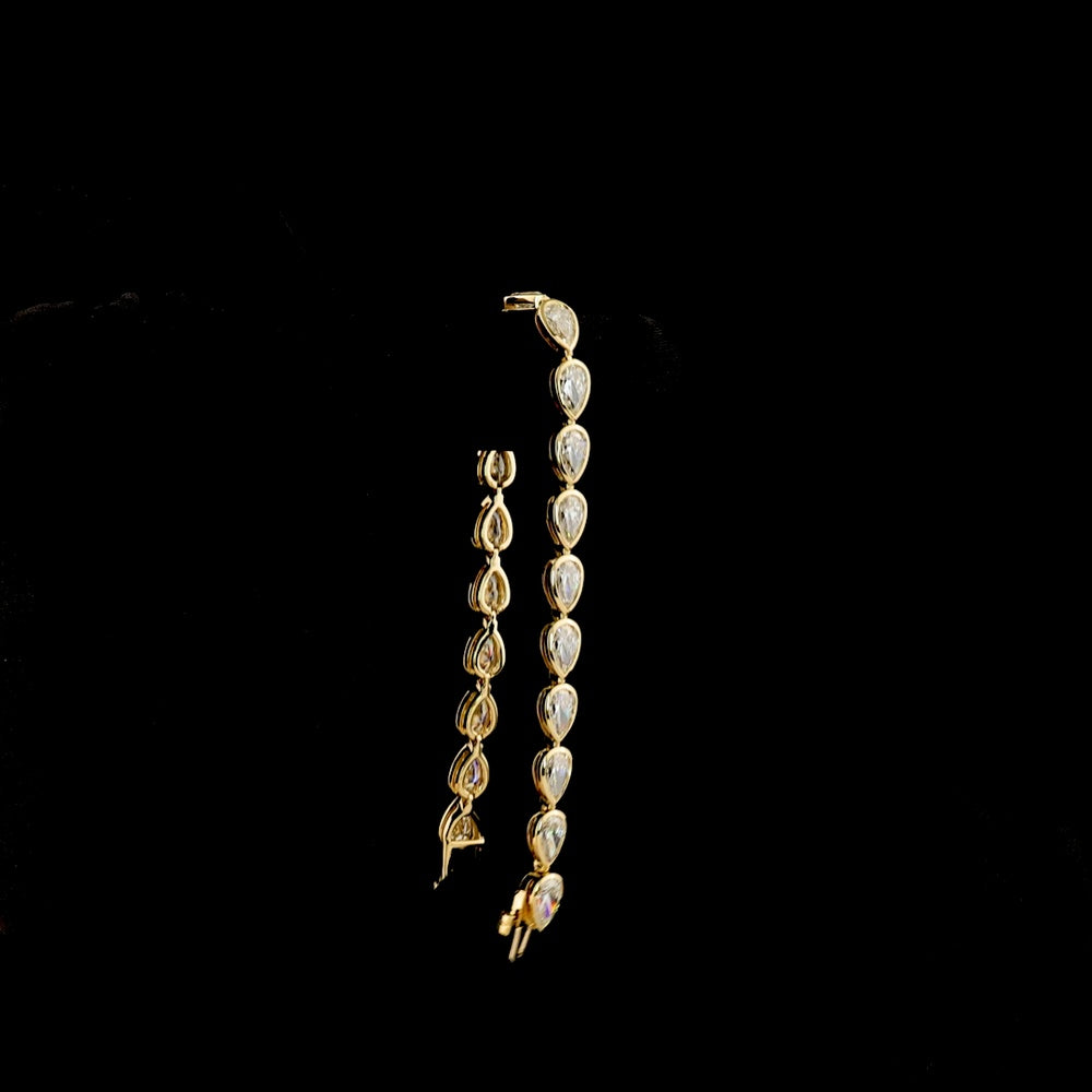 14K Yellow Gold Tennis Bracelet with East-West Bezel Set Pear Shaped Lab Diamonds - 10.98 Carat Total Weight (21 Stones, E-F Color, VS1 Clarity) - Covaloro Fine Jewelry