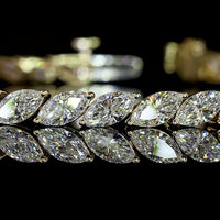 14K Yellow Gold Tennis Bracelet with Inclined Prong Set Marquise Cut Lab Diamonds - 6.88 Carat Total Weight (E-F Color, VS Clarity) - Covaloro Fine Jewelry