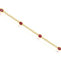 14K Yellow Gold Tennis Bracelet with Oval Bezel-Set Rubies and Round Diamond Accents - 1.25 Carat Ruby Total Weight & 0.55 Carat Diamond Total Weight - Royal Jewelry