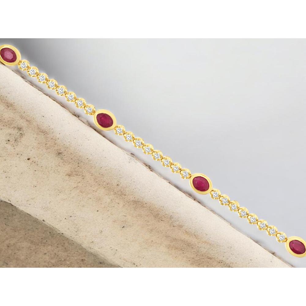 14K Yellow Gold Tennis Bracelet with Oval Bezel-Set Rubies and Round Diamond Accents - 1.25 Carat Ruby Total Weight & 0.55 Carat Diamond Total Weight - Royal Jewelry