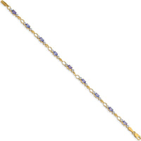 14K Yellow Gold Tennis Bracelet with Oval Tanzanite and Round Diamonds - 0.3 Carats Tanzanite, 0.012 Carats Diamond Total Weight by Monteluci Fine Jewelry