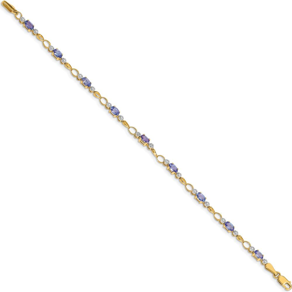 14K Yellow Gold Tennis Bracelet with Oval Tanzanite and Round Diamonds - 0.3 Carats Tanzanite, 0.012 Carats Diamond Total Weight by Monteluci Fine Jewelry