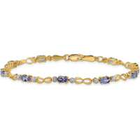 14K Yellow Gold Tennis Bracelet with Oval Tanzanite and Round Diamonds - 0.3 Carats Tanzanite, 0.012 Carats Diamond Total Weight by Monteluci Fine Jewelry