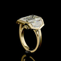 14K Yellow Gold Three-Stone Bezel Set Ring with Emerald Cut Lab Diamonds - 9.08 Carats Center, 12.22 Carats Total Diamond Weight - Covaloro Fine Jewelry