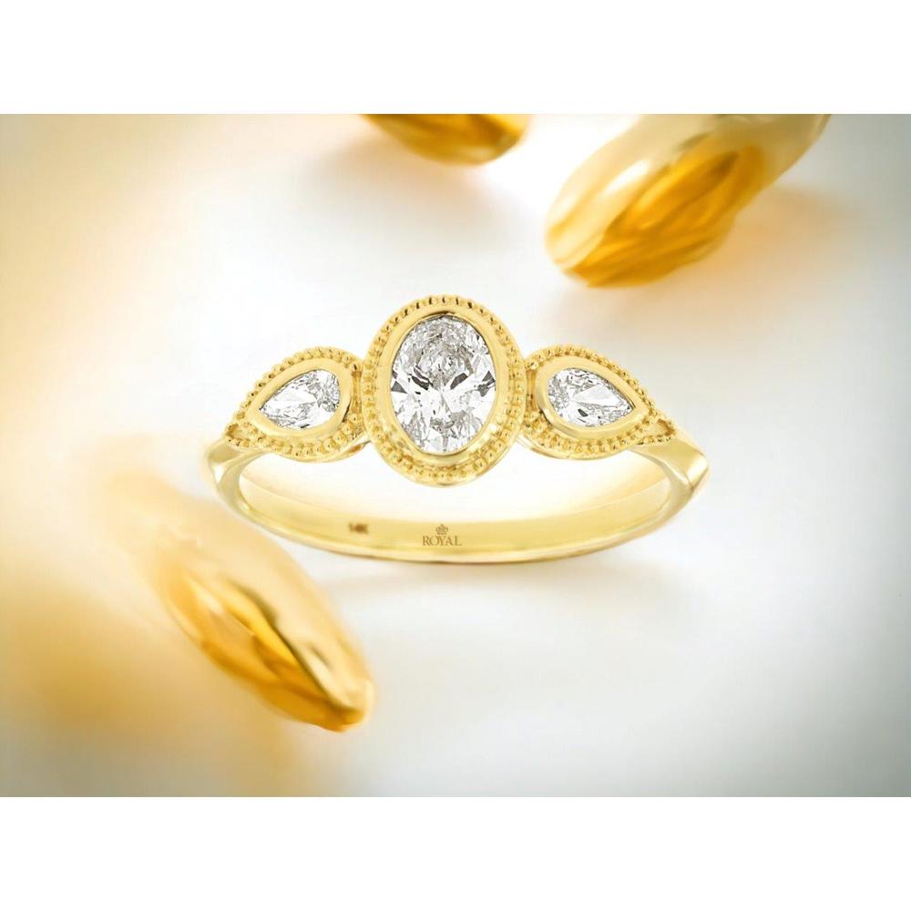 14K Yellow Gold Three Stone Engagement Ring with 0.60 Carat Oval Diamond and Milgrain Detail, Featuring Pear Shaped Side Diamonds - Royal Jewelry