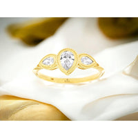 14K Yellow Gold Three-Stone Engagement Ring with Milgrain Edge and Pear Cut Diamonds - 0.52 Carat Center Diamond - Royal Jewelry