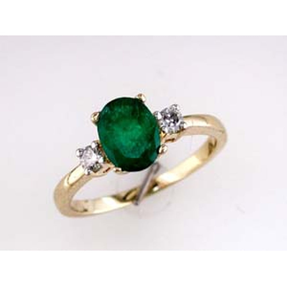 14K Yellow Gold Three Stone Ring with 1.20 Carat Oval Emerald and Round Diamond Accents - 0.17 Carat Total Diamond Weight - Royal Jewelry