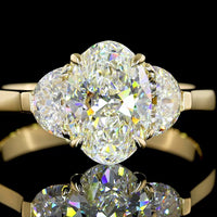 14K Yellow Gold Three-Stone Ring with 1.50 Carats Oval Cut Lab Diamond and Half-Moon Accent Diamonds - 2.15 Carats Total Diamond Weight - Covaloro Fine Jewelry