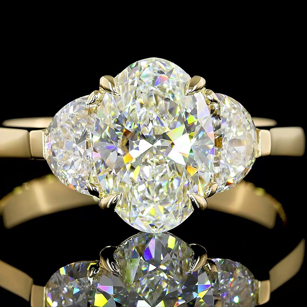 14K Yellow Gold Three-Stone Ring with 1.50 Carats Oval Cut Lab Diamond and Half-Moon Accent Diamonds - 2.15 Carats Total Diamond Weight - Covaloro Fine Jewelry