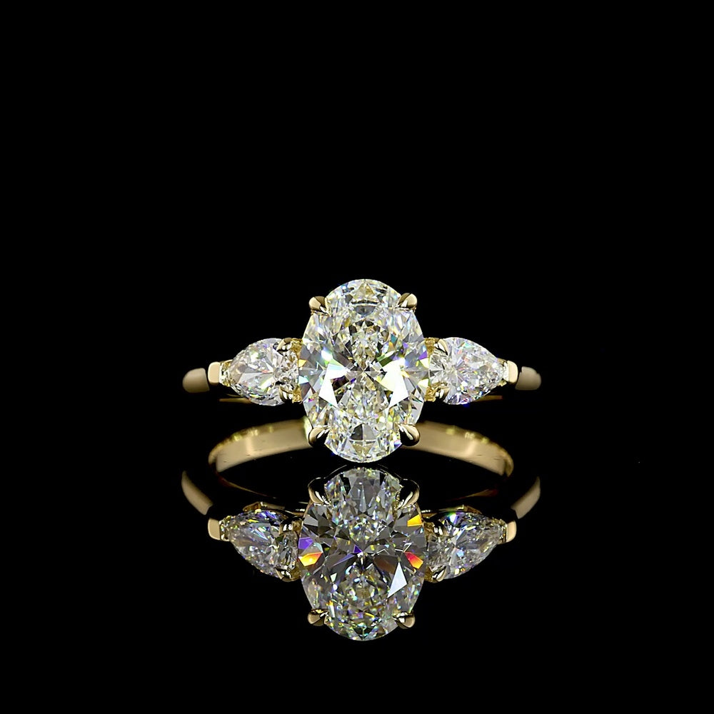 14K Yellow Gold Three Stone Ring with 1.56 Carat Oval Cut Lab Diamond (D VVS2) and 0.49 Carat Pear Shaped Lab Diamonds - 2.05 Carat Total Diamond Weight - Covaloro Fine Jewelry