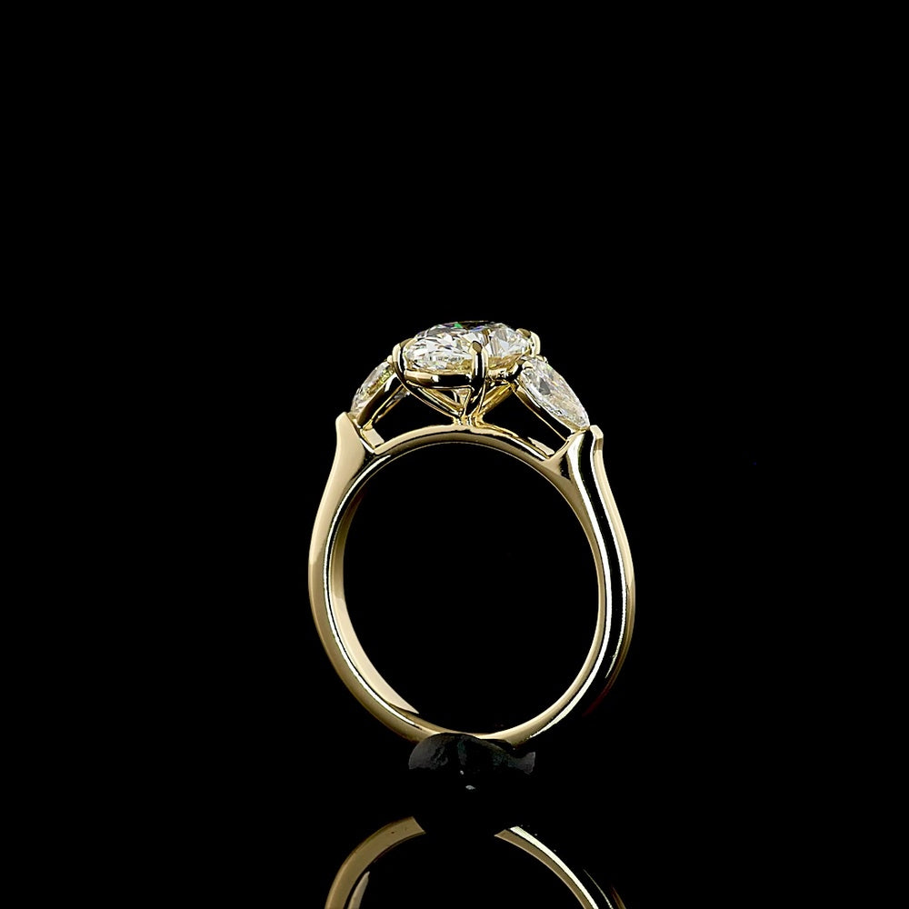 14K Yellow Gold Three Stone Ring with 1.56 Carat Oval Cut Lab Diamond (D VVS2) and 0.49 Carat Pear Shaped Lab Diamonds - 2.05 Carat Total Diamond Weight - Covaloro Fine Jewelry