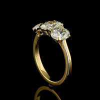14K Yellow Gold Three Stone Ring with 2.05 Carats Oval Cut Lab Diamond and 0.94 Carats Half-Moon Lab Diamonds - 2.99 Carats Total Diamond Weight - Covaloro Fine Jewelry