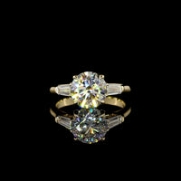 14K Yellow Gold Three-Stone Ring with 2.52 Carat Round Brilliant Lab Diamond and 0.54 Carat Tapered Baguette Side Stones - 3.06 Carats Total Diamond Weight - Covaloro Fine Jewelry