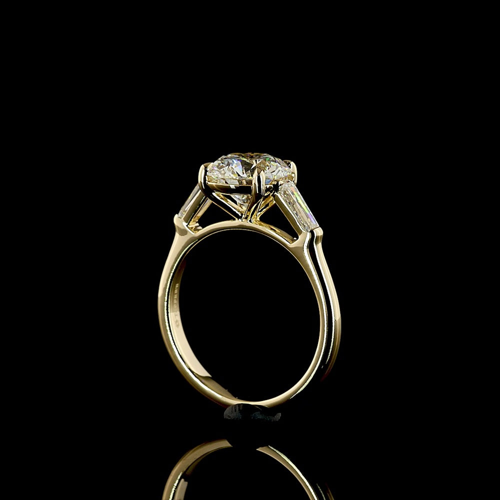 14K Yellow Gold Three-Stone Ring with 2.52 Carat Round Brilliant Lab Diamond and 0.54 Carat Tapered Baguette Side Stones - 3.06 Carats Total Diamond Weight - Covaloro Fine Jewelry