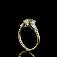 14K Yellow Gold Three-Stone Ring with 2.53 Carat Round Lab Diamond and Tapered Baguette Side Stones - 2.90 Carats Total Diamond Weight (E VVS2 IGI Certified) - Covaloro Fine Jewelry