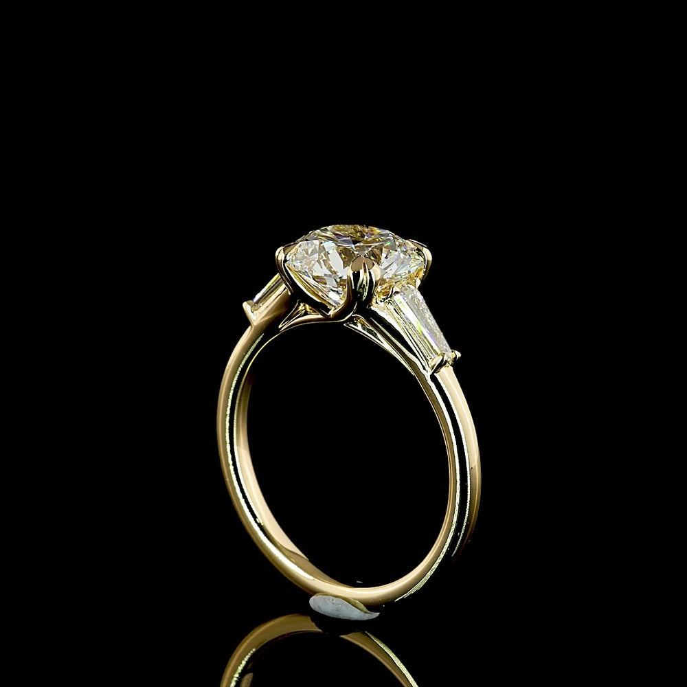 14K Yellow Gold Three-Stone Ring with 2.53 Carat Round Lab Diamond and Tapered Baguette Side Stones - 2.90 Carats Total Diamond Weight (E VVS2 IGI Certified) - Covaloro Fine Jewelry