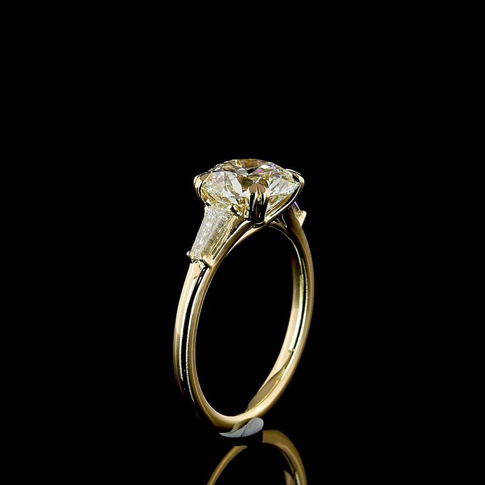 14K Yellow Gold Three-Stone Ring with 2.53 Carat Round Lab Diamond and Tapered Baguette Side Stones - 2.90 Carats Total Diamond Weight (E VVS2 IGI Certified) - Covaloro Fine Jewelry