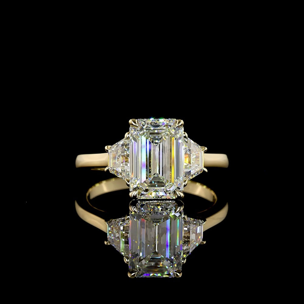 14K Yellow Gold Three Stone Ring with 2.69 Carat Emerald Cut Lab Diamond and 0.79 Carat Trapezoid Side Stones - 3.48 Carat Total Diamond Weight - Covaloro Fine Jewelry